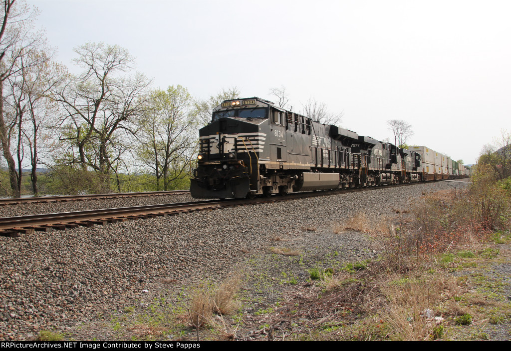 NS 8134 takes a train  down the siding at Cove PA